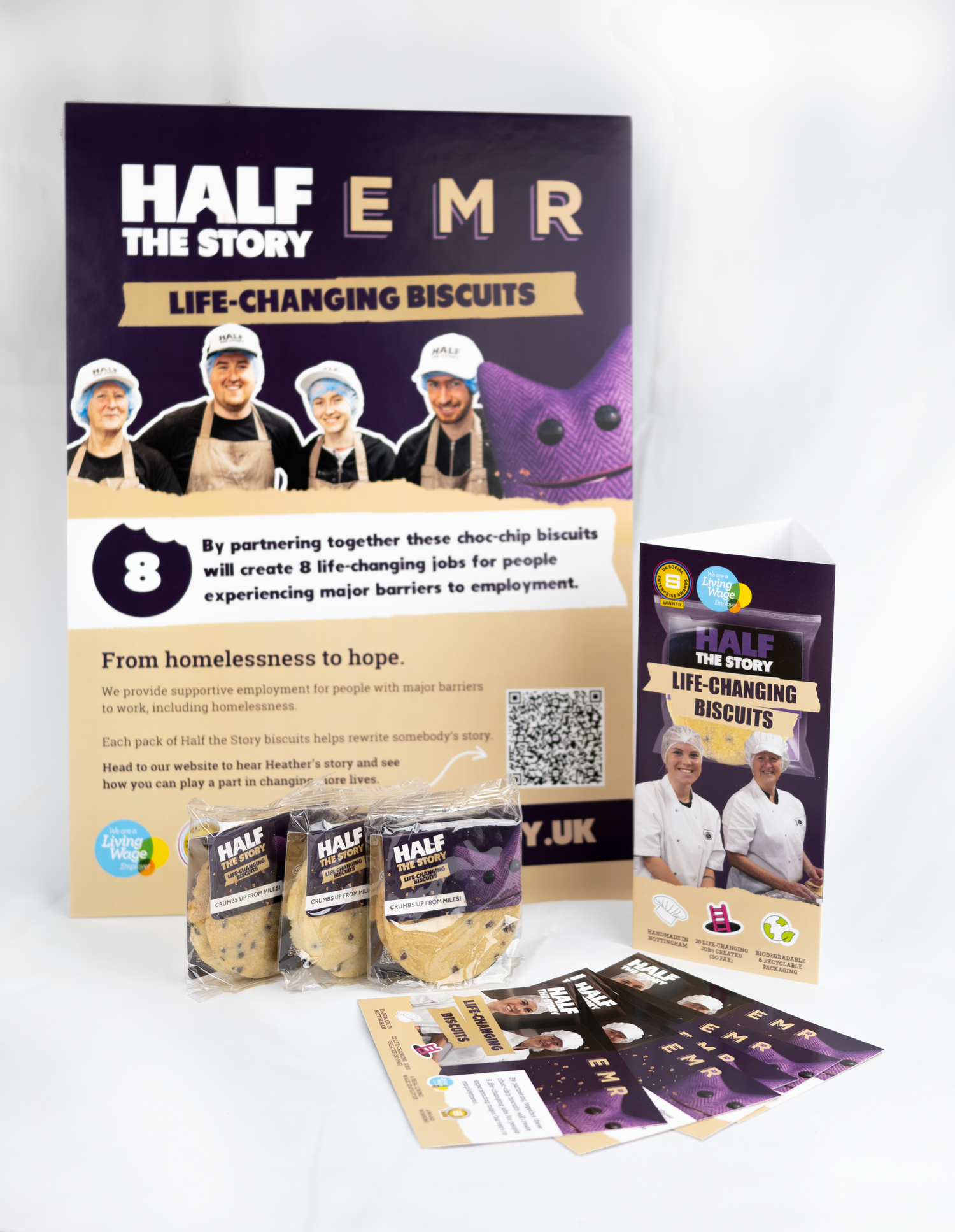 Promotional materials for 'Half the Story' life-changing biscuits on a white background